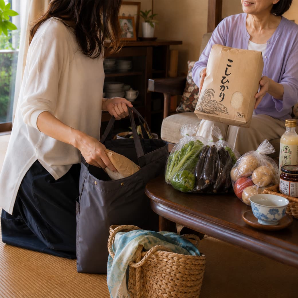 実家から米や野菜などの荷物を持ち帰る女性のイメージ